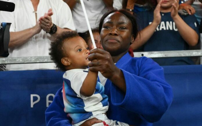 fotografije olimpijskih medaljista sa decom